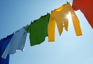 <img src="clothesline wih clothes" alt="colorful laundry drying on a clothesline">